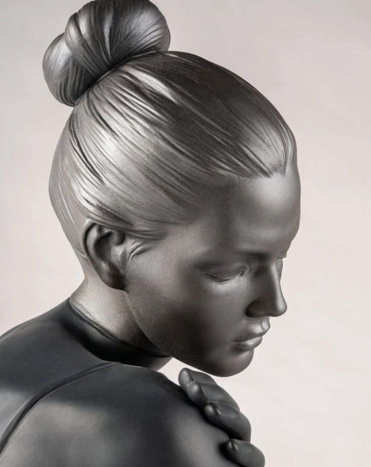 HER SCULPTURE